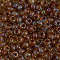 ROUND ROCAILLE 11/0 Picasso Transp Saffron 4501 ROUND ROCAILLE 11/0 Picasso Transp Saffron 4501