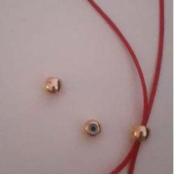 Brass Bead 6mm with Rubber Tube (Ideal for Holding 2 Cords of 1mm) Gold Plated Brass Bead 6mm with Rubber Tube (Ideal for Holding 2 Cords of 1mm) Gold Plated