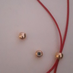 Brass Bead 6mm with Rubber Tube (Ideal for Holding 2 Cords of 1mm) Gold Plated Brass Bead 6mm with Rubber Tube (Ideal for Holding 2 Cords of 1mm) Gold Plated