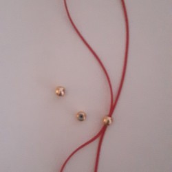 Brass Bead 6mm with Rubber Tube (Ideal for Holding 2 Cords of 1mm) Gold Plated Brass Bead 6mm with Rubber Tube (Ideal for Holding 2 Cords of 1mm) Gold Plated